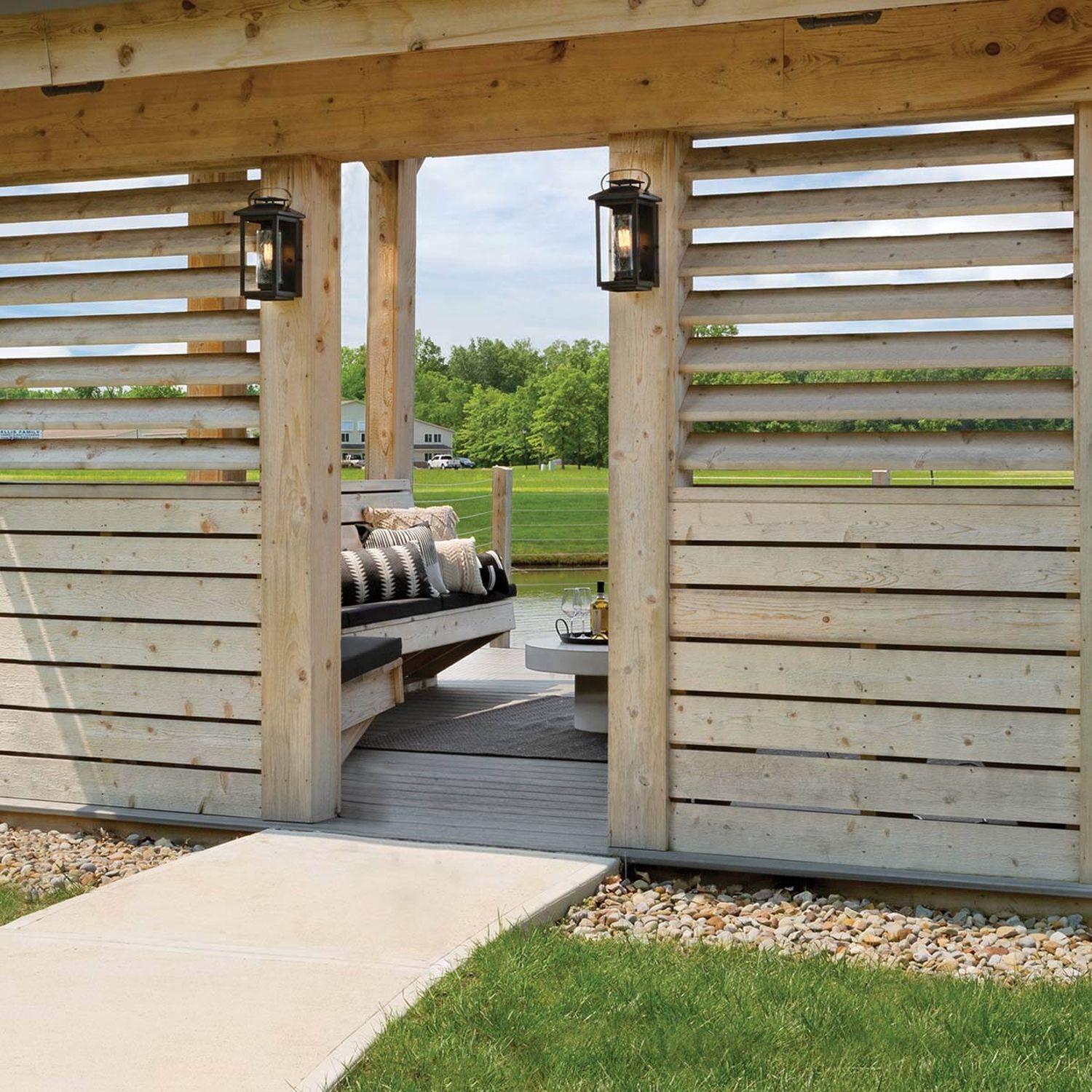 outdoor lounge, gazebo, wood slat wall, lanterns, patio furniture