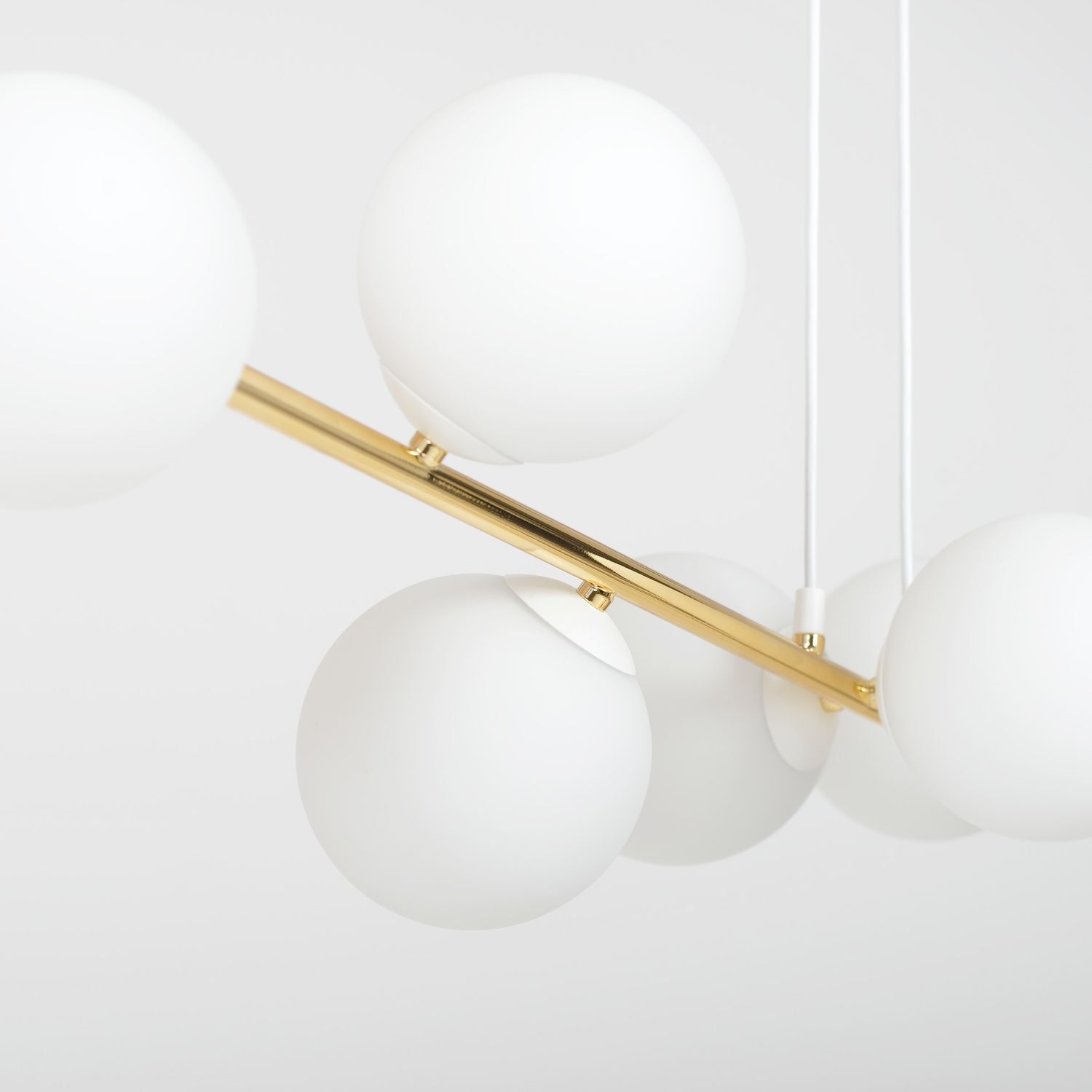 Lampe à suspendre métal verre en blanc or 110 cm de long